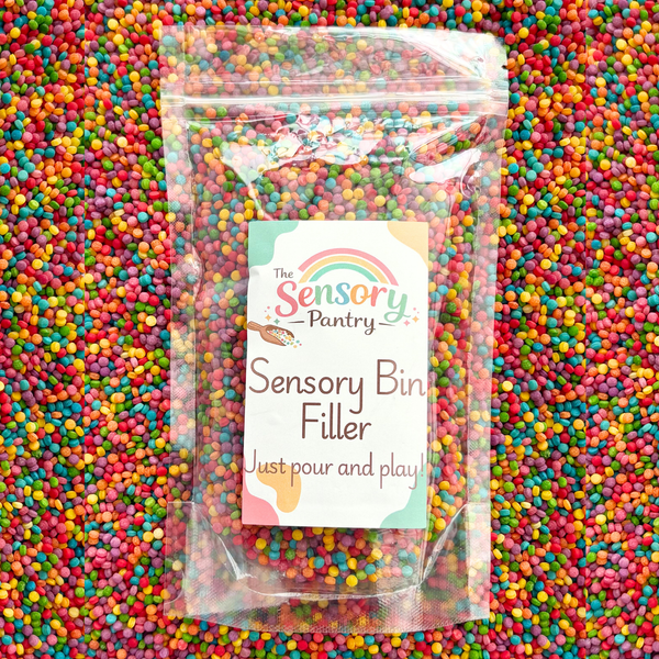 Packaged sensory bin filler with a label on a colorful background